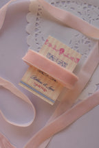 Soft pink velvet ribbon (15mm wide, 2 Metres) wrapped tightly around a "Sunlit Hugs" card, emphasizing the plush velvet pile.