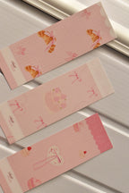 This image displays the beautiful front designs of the Dessert Recipe Bookmarks, highlighting the pastel pink colour and charming croissant, cake, and macaron illustrations.