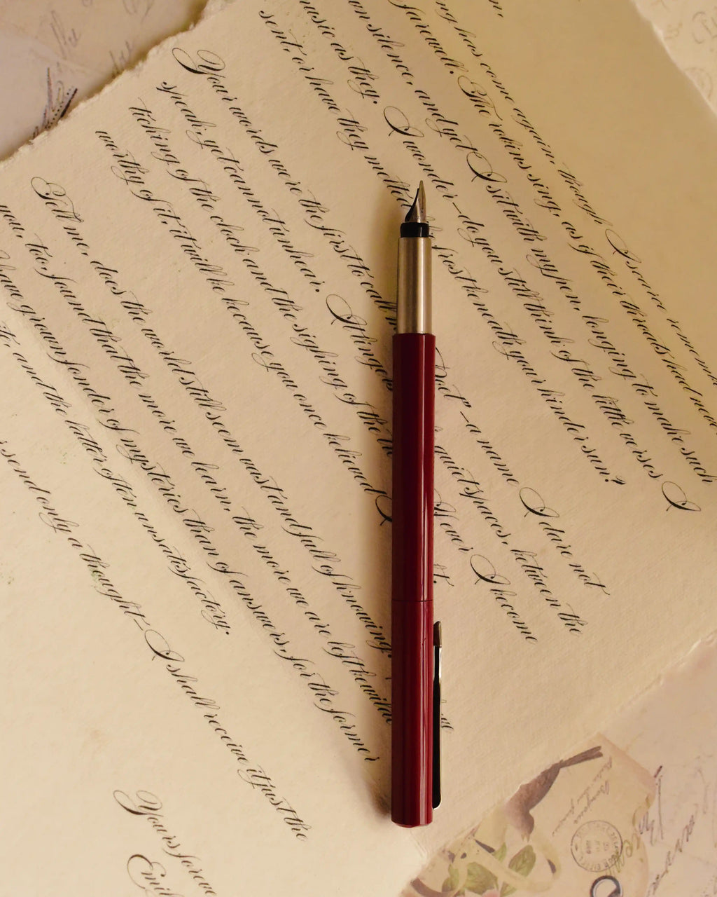 This intimate view captures the detail of the elegant vintage calligraphy style and the soft texture of the handmade paper, celebrating the heartfelt sincerity of the written word.