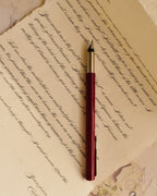 This intimate view captures the detail of the elegant vintage calligraphy style and the soft texture of the handmade paper, celebrating the heartfelt sincerity of the written word.